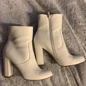 White high heeled boots